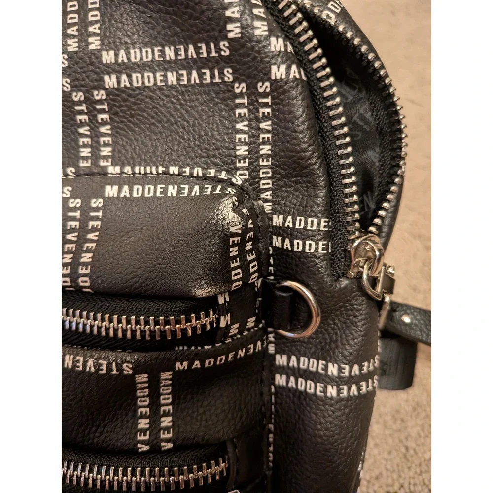 Steve Madden Black Logo Print Pebbled Leather Backpack Front Zip Pockets